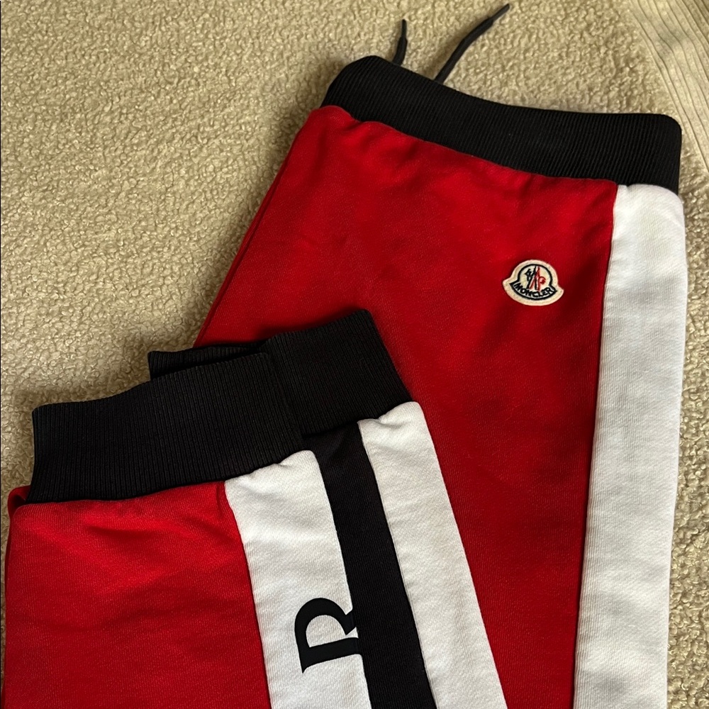Moncler Kids Red Joggers with Black and White Stripes.Never worn,brand new.